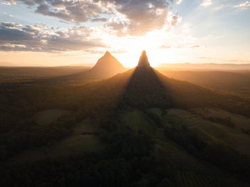 6616ab8ed8c3c268632d0a1d_glass-house-mountains-australia-landscape-_1755563269082.jpg
