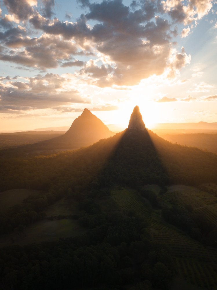 6616ab8ed8c3c268632d0a1d_glass-house-mountains-australia-portrait-_1755563269083.jpg