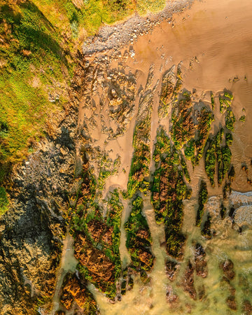 6616ab8ed8c3c268632d0a1d_sandy-beach-rocks-pano_1754196215776.jpg
