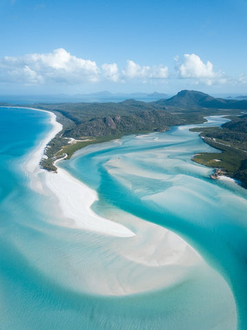 6616ab8ed8c3c268632d0a1d_swirling-sands-at-whitehaven-beach-australia-portrait-_1755822643598.jpg