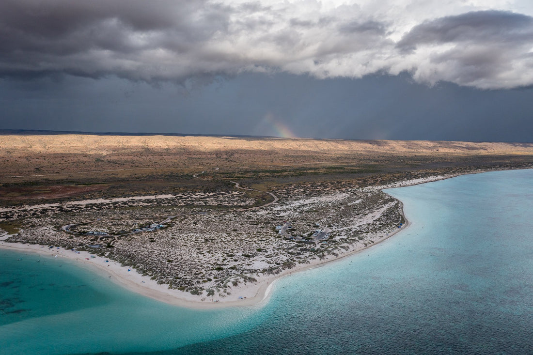 6616ab8ed8c3c268632d0a1d_turquoise-bay-rainbow_1747647129487.jpg