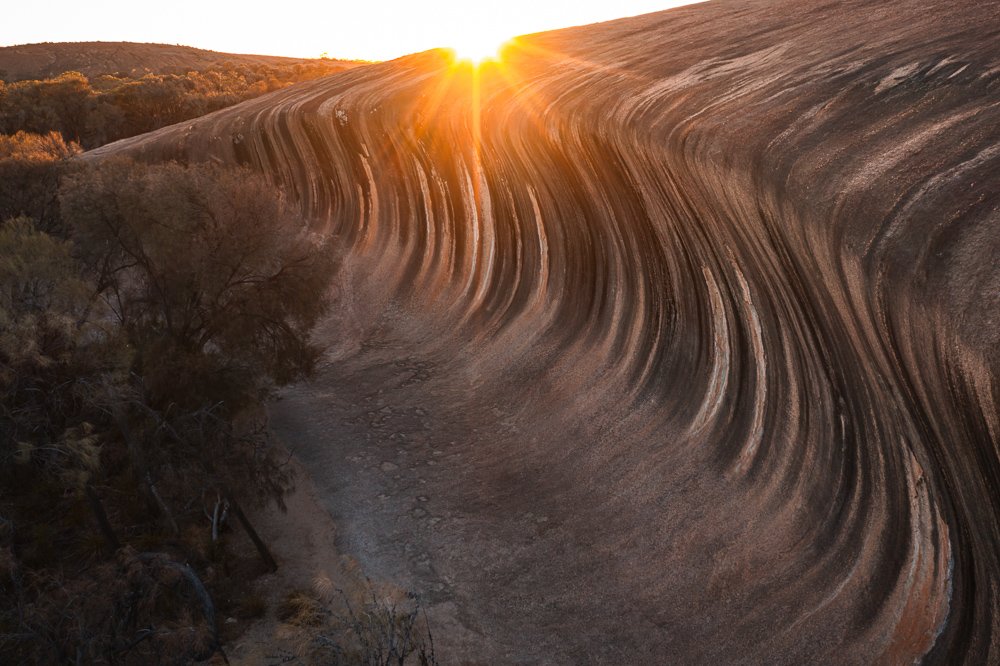 6616ab8ed8c3c268632d0a1d_wave-rock-western-australia-landscape-_1755669023751.jpg