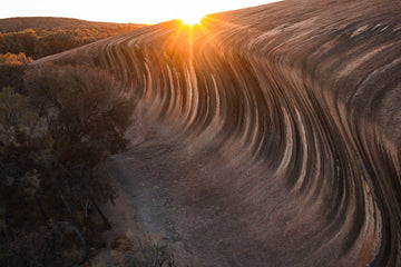 6616ab8ed8c3c268632d0a1d_wave-rock-western-australia-landscape-_1755669023751.jpg