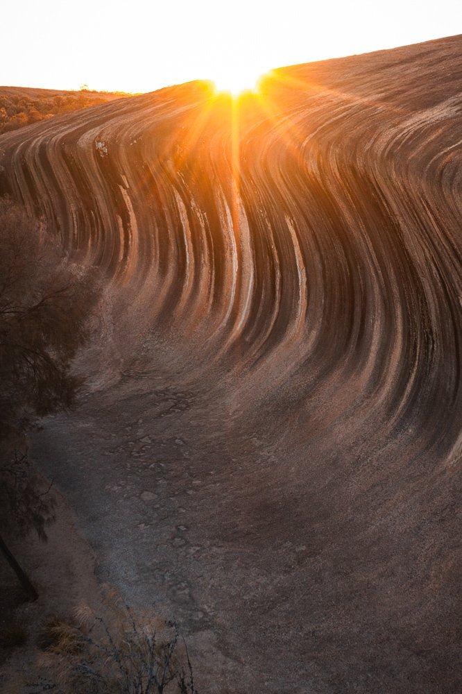 6616ab8ed8c3c268632d0a1d_wave-rock-western-australia-portrait-_1755669023751.jpg