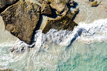 Wave crashing on rocks