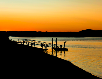 Fishing at sunset on Noosa River, Sunshine Coast